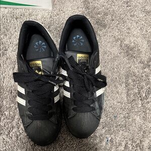 Adidas Black Sneakers with White Stripes